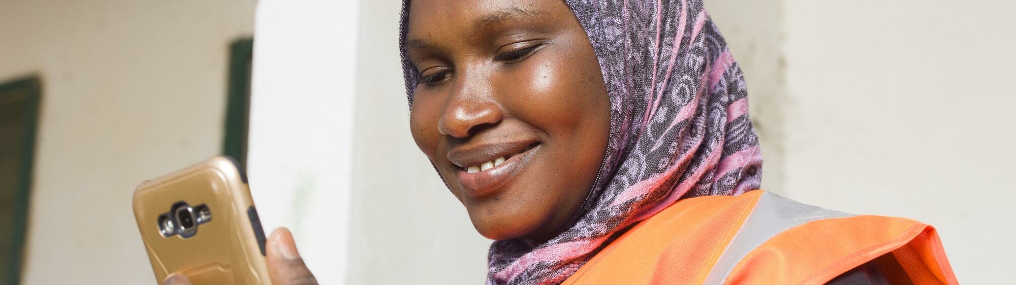 Health worker using mobile handset