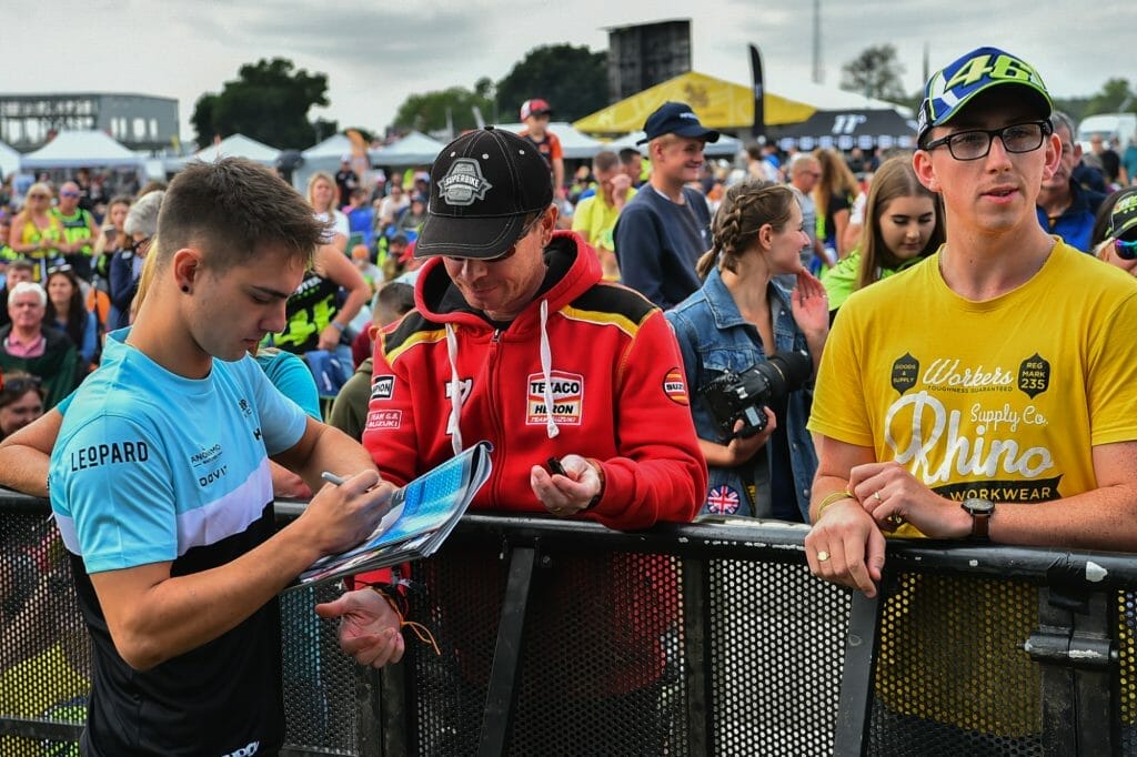 Tom Booth Amos Signs Autographs Day of Champions Silverstone MotoGP Two Wheels for Life