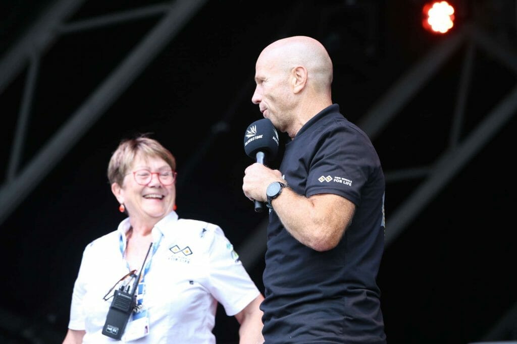 Andrea Coleman and Randy Mamola having a laugh on stage