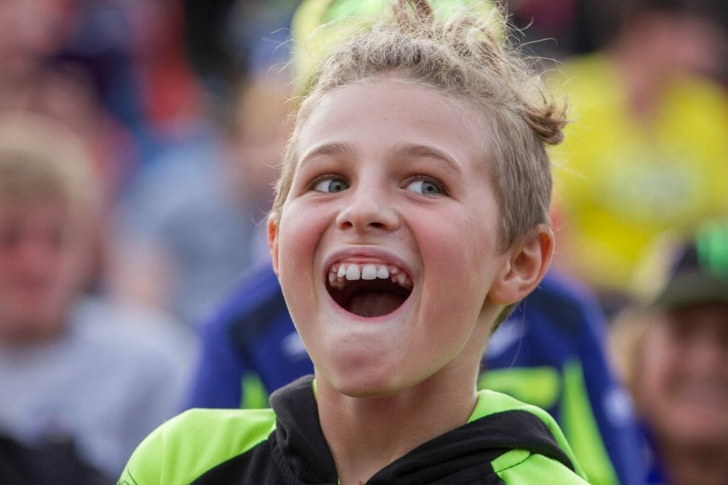 The most excited kid at Day of Champions as his hero smiles at him