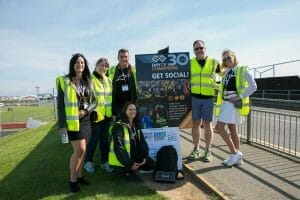 Volunteers reminding you to go social