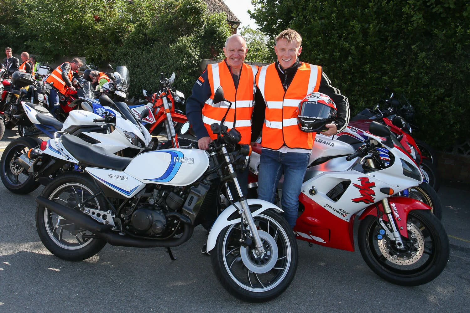 Niall Mackenzie and son Taylor lead the ride-in to Day of Champions