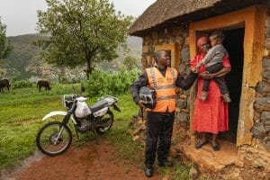 Lesotho, healthworker, mother, child, motorcycle